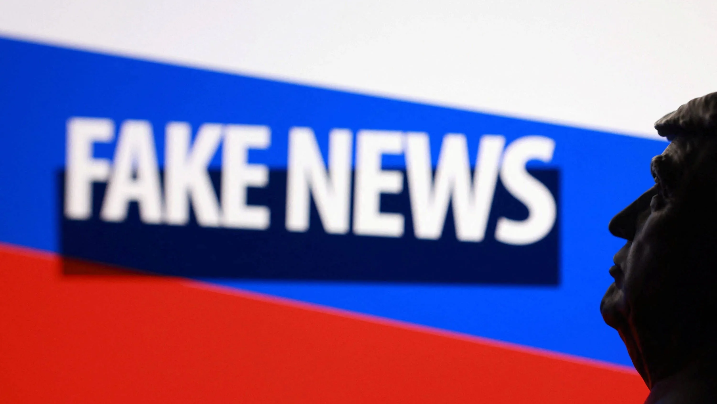 illustration-shows-3d-printed-miniature-of-u-s-president-donald-trump-russian-flag-and-words-fake-news