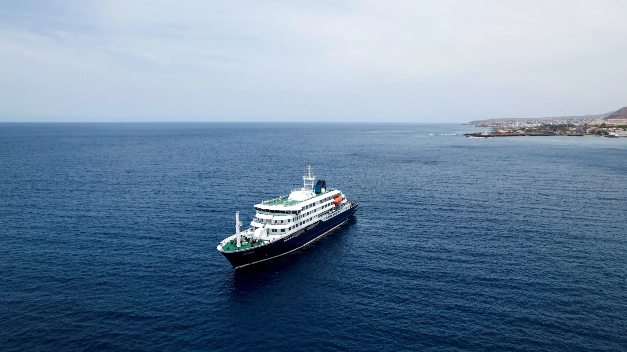 a-drone-view-of-the-cruise-ship-mv-hondius-carrying-passengers-suspected-of-having-cases-of-hantavirus-on-board-as-it-prepares-to-leave-praia
