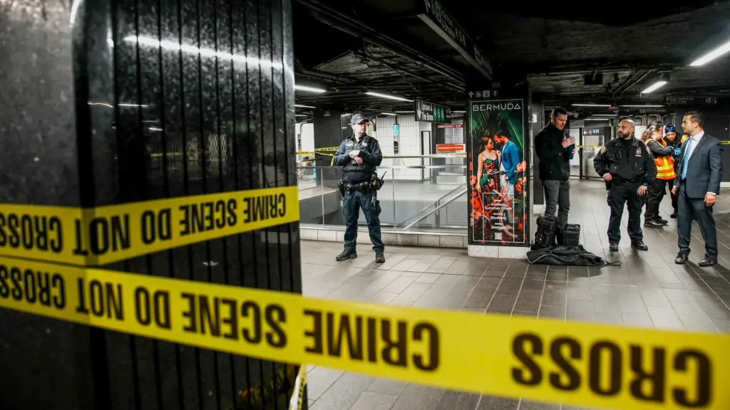 new-york-city-police-department-nypd-officers-stand-guard-near-the-crime-scene-where-three-people-were-attacked-inside-the-subway-system-at-grand-central-station-in-new-york