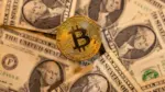 file-photo-illustration-shows-representation-of-virtual-cryptocurrency-bitcoin-and-u-s-dollar-banknotes