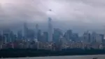 rain-clouds-over-the-new-york-city-skyline-and-the-hudson-river-are-seen-from-fort-lee