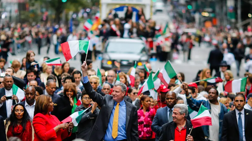 new-york-mayor-de-blasio-waves-to-the-people-while-he-attends-the-70th-annual-columbus-day-parade-in-new-york