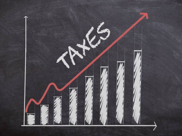 tax-concept-with-histogram-chart-and-curve-going-up-tax-increasing