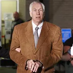 062312-sandusky-cuffs-400