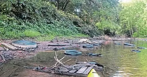 tires-in-river