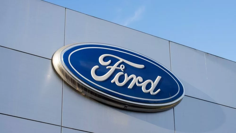 Closeup of the Ford logo seen at a Ford dealership store in Sunnyvale^ California. Ford Motor Company is an American multinational automobile manufacturer. Sunnyvale^ CA^ USA - Nov 22^ 2023