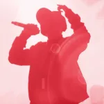 Silhouette of rap band performing on concert stage in bright red lights. Unrecognizable young rapper singing on concert