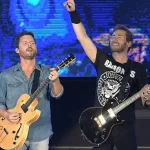 Guitarists Chad Kroeger and Ryan Peake of Canadian rock band Nickelback during a concert at Rock in Rio 2019 in Rio de Janeiro.