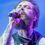 Post Malone performs at Bonnaroo music festival before a huge crowd Manchester^ Tennessee USA - 06-15-2024