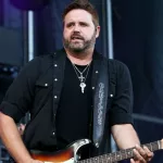 Randy Houser performs during Luke Bryan's 'Kick The Dust Up' Tour at Vanderbilt Stadium on July 11^ 2015 in Nashville^ Tennessee.