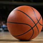 Indoor photo of basketball on the basketball court^ no people^ no brand