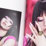 BlackPink BORN PINK 2nd Album photobook with Lisa on grey.