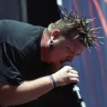Vocalist Dave Williams of the Heavy Metal band Drowning Pool performs in concert June 6^ 2001 at Mile High Stadium in Denver^ CO.