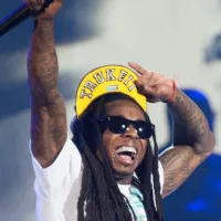 Rapper Dwayne Michael Carter^ Jr. aka Lil Wayne performs in concert as part of America's Most Wanted Tour at Sleep Train Arena on August 28^ 2013 in Sacramento^ California.