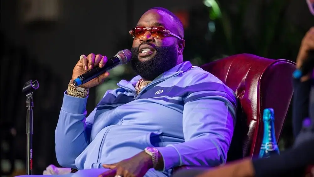 Rick Ross speaking with President A. Zachary Faison Jr. and Guest Host at Edward Waters University JACKSONVILLE FLORIDA - NOVEMBER 3^ 2022