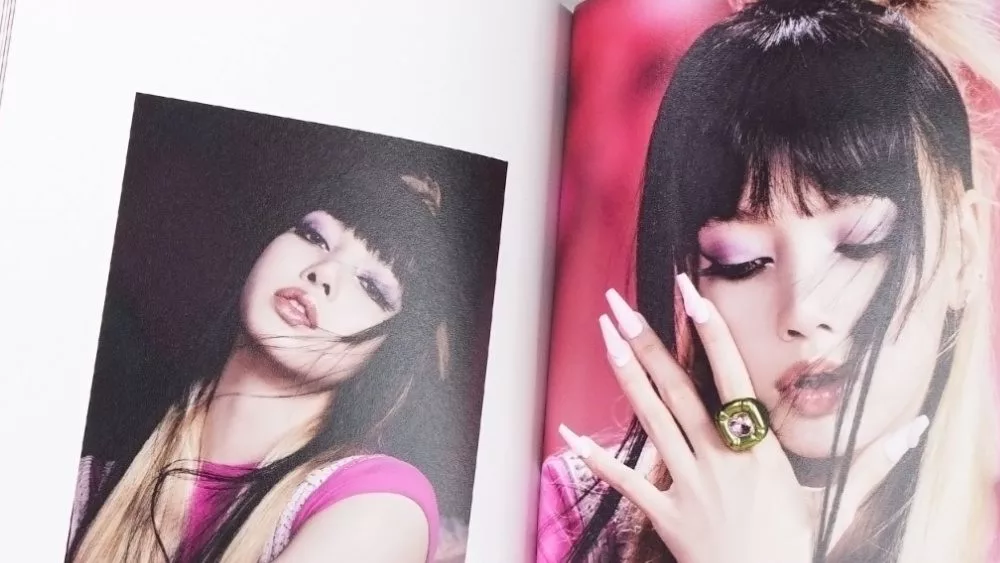 BlackPink BORN PINK 2nd Album photobook with Lisa on grey. South Korean girl group BlackPink.