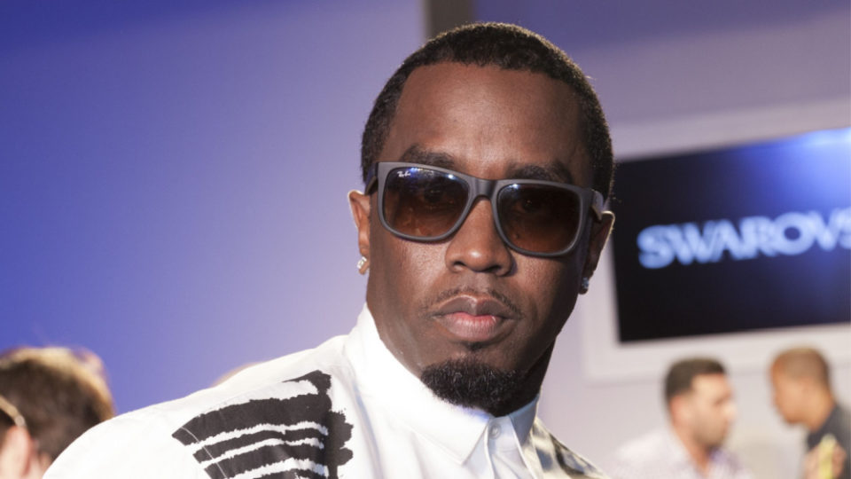 Diddy shares first look at his new baby girl in family Christmas photos ...