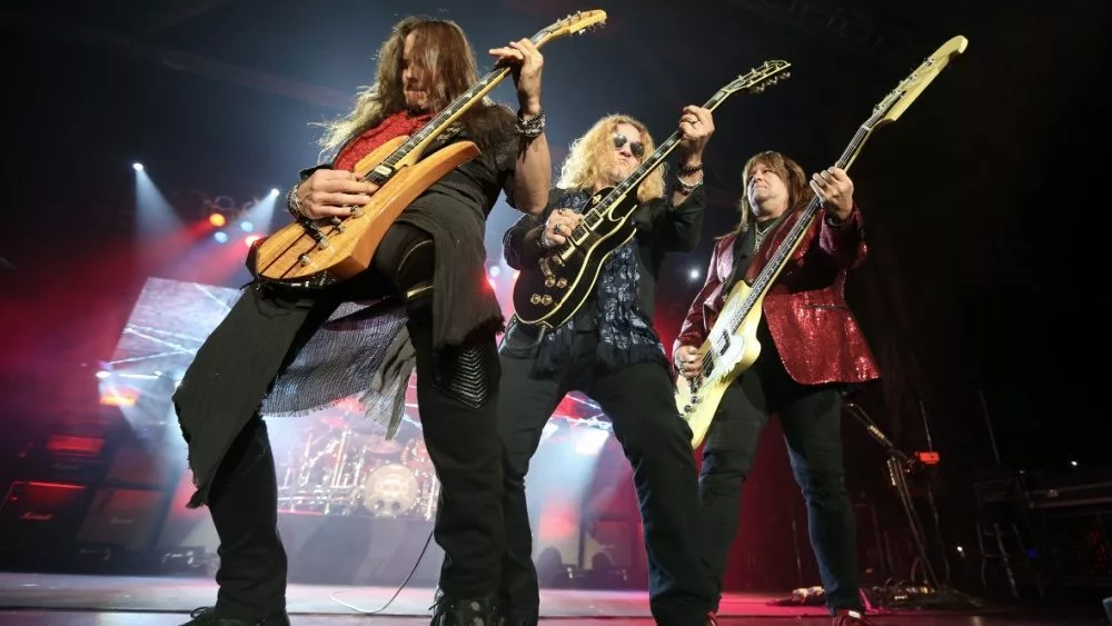 (L-R) Dave Rude^ Frank Hannon and Brian Wheat of Tesla performs onstage at the Paramount on October 25^ 2018 in Huntington^ New York.