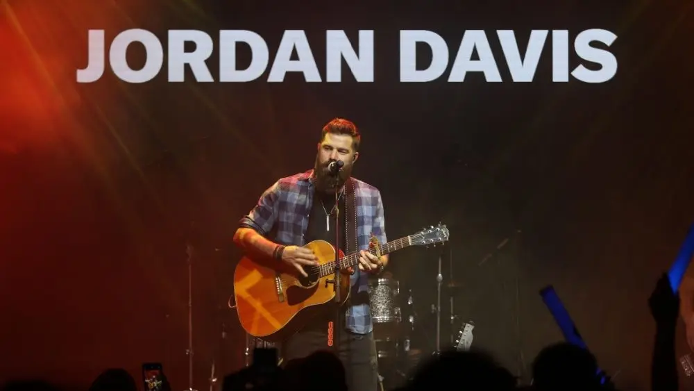 Jordan Davis performs at CMT's RAMJAM on June 3^ 2019 at TopGolf in Nashville^ Tennessee.