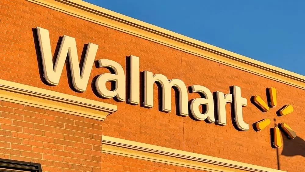 Walmart sign at store exterior. Novi^ Michigan^ USA - AUGUST 8^ 2021: