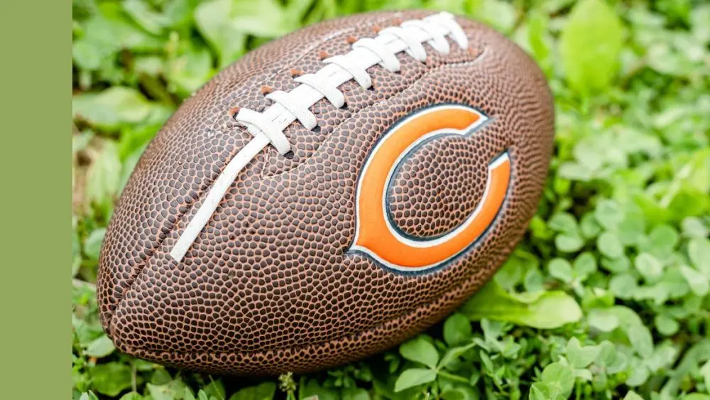 Football with Chicago Bears logo the on grass. Chicago Bears of the National Football Conference North. Rockford^ WI / USA.- Feb 12^ 2019