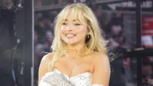 Sabrina Carpenter performs on stage during 2024 New Year's celebration on Times Square in New York on December 31^ 2023.