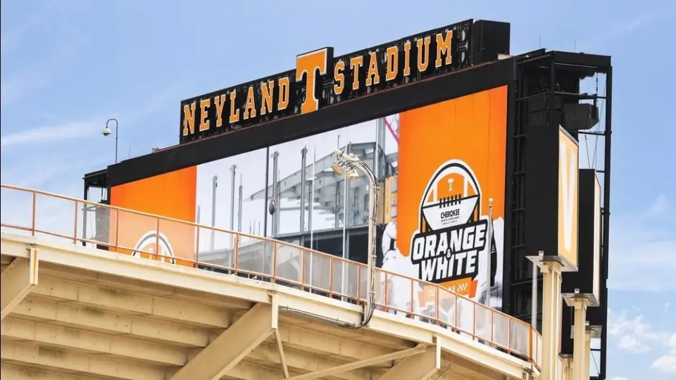 Neyland Stadium is home to the University of Tennessee Volunteer sports teams^ primarily the football team. The stadium has a capacity of 101^915 people. Knoxville^ TN^ USA - April 12^ 2025