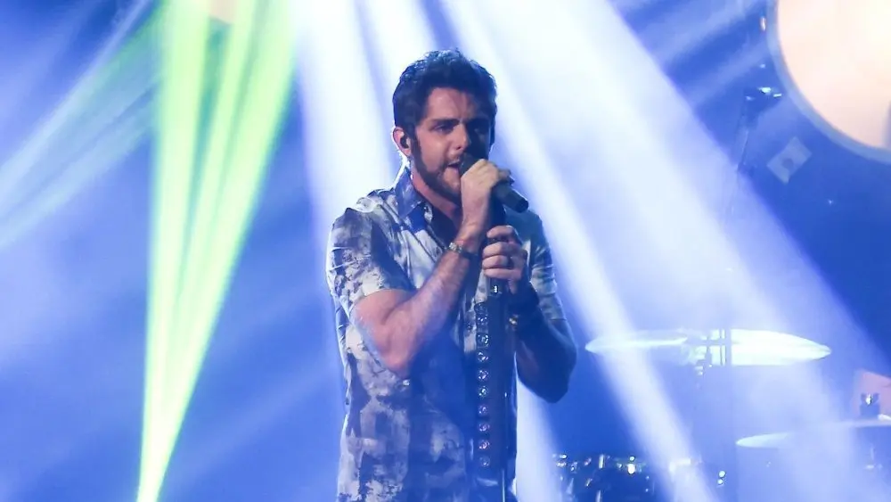 Thomas Rhett performs at the iHeartRadio Album Release Party with Thomas Rhett on September 28^ 2015 at the iHeartRadio Theater in New York City.