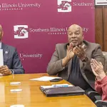 (From left) SIU Carbondale Chancellor Austin Lane, Vice Chancellor for Enrollment Management Wendell Williams and Director of Undergraduate Admissions Sarah Jiter celebrate the launch of the Saluki Start Dual Enrollment Program. (Photo credit: SIU)