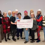 Deaconess Illinois Crossroads Auxiliary has received a generous donation from John & Patti Bach with IWA Productions in support of breast cancer awareness and mammography services in our region. (Photo credit: Deaconess Illinois Crossroads)
