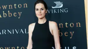 Michelle Dockery wearing dress by Armani attend the "Downton Abbey" New York premiere at Alice Tully Hall Lincoln Center. New York^ NY - September 16^ 2019
