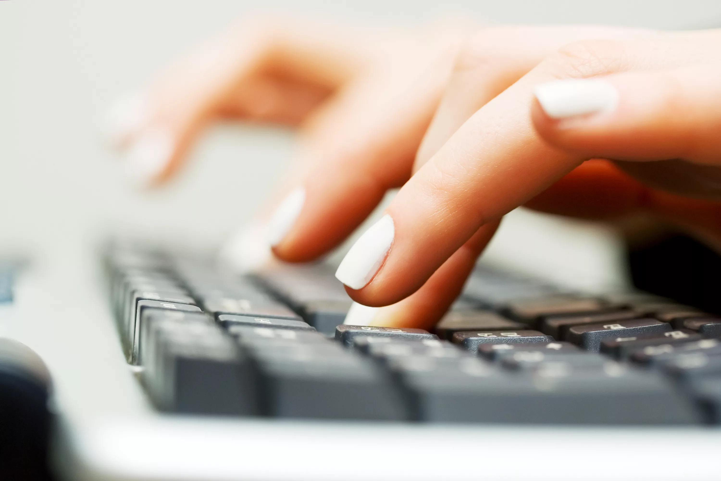 female-hands-typing-on-the-computer-keyboard