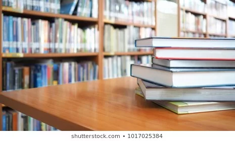 book-stack-on-wood-desk-2