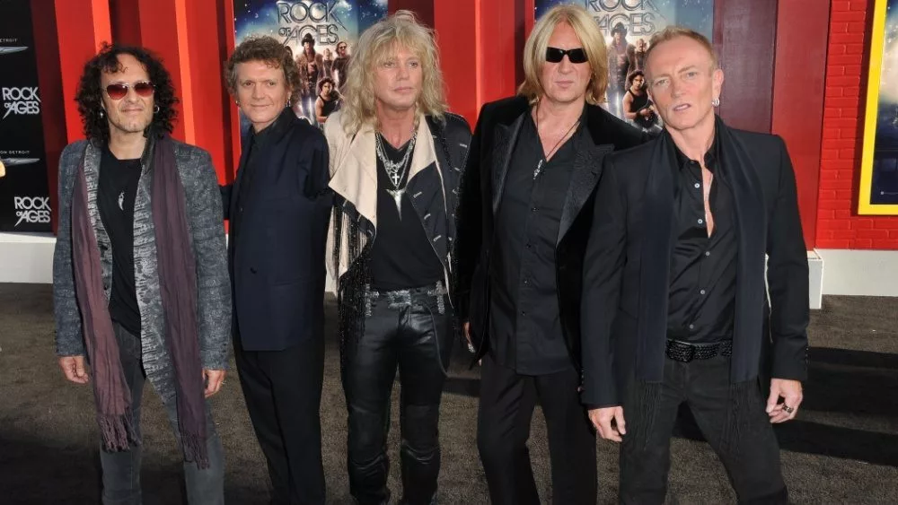Def Leppard at the world premiere of "Rock of Ages" at Grauman's Chinese Theatre^ Hollywood. June 9^ 2012 Los Angeles^ CA Picture: Paul Smith / Featureflash