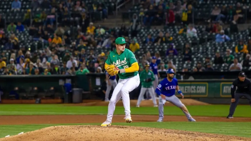 Oakland Athletics pitcher Mason Miller pitches against the Texas Rangers at the Oakland Coliseum. Oakland^ California - September 24^ 2024
