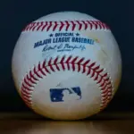 Baseball with 'Official Major League Baseball' Inscription and Blue MLB Batter Silhouette Logo