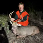 Gage Rakers: I'm 14, and I was trying to get my first deer. We had 10 minutes left before shooting time was over, and out comes this 8 pointer around 90 yards out. I couldn't get a good shot for 7 or 8 minutes. With 3 minutes left, he was facing right towards me with his head up, and I shot. He fell right where he stood, and I got my first deer.