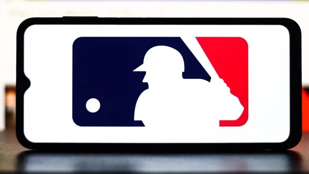 Selective focus of the MLB logo. It is the premier professional baseball league in North America^ featuring top players and teams:
