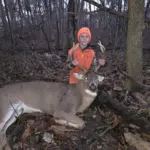 Aaron Cummins: My son Hadley killed this buck during 1st gun season, 10 yd shot, 11pt with a live weight of 245lbs.