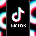 Smart phone with TIK TOK logo^ popular social network based in China