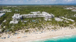 Aerial view from drone on RIU resort building on caribbean beach in Punta Cana^ Bavaro^ Dominican Republic - 8 April 2022