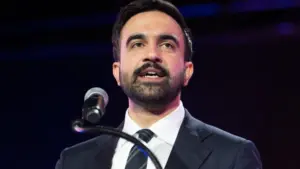 Mayoral candidate Zohran Mamdani speaks during 'New York is not for sale' rally at Forest Hill Stadium in New York on October 26^ 2025.