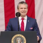 U.S. Secretary of Defense Peter Hegseth speaks at the National Memorial Day Observance at Arlington National Cemetery. ARLINGTON^ VA^ USA - May 26^ 2025