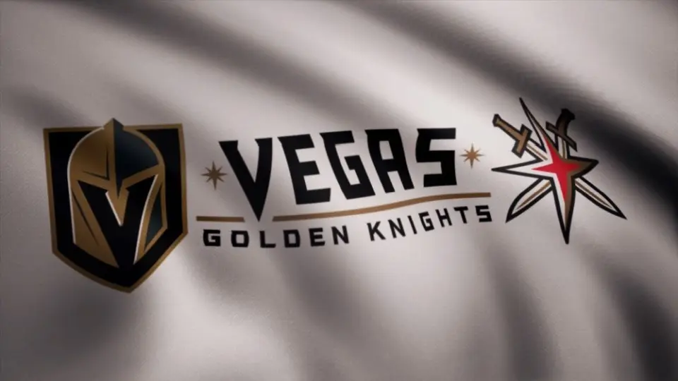 Waving flag with Vegas Golden Knights NHL hockey team logo. Close-up of waving flag with Vegas Golden Knights NHL hockey team logo^ seamless loop. Editorial footage