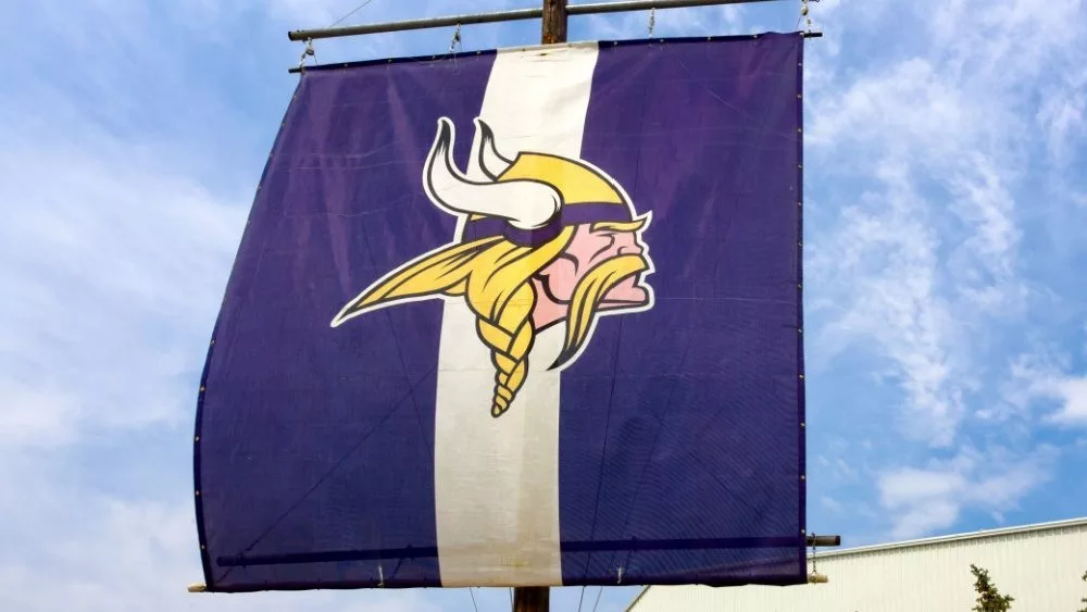 Minnesota Vikings practice facility and flag. The Minnesota Vikings are a professional American football team based in Minneapolis^ Minnesota. EDEN PRAIRIE^ MN/USA - August 13^ 2015