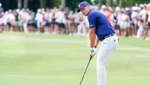 Bryson DeChambeau^ captain of Crushers GC^ chips on to the first green during the final round of LIV Golf Miami on April 6^ 2025 at Trump National Doral. DORAL^ FL - APR 6