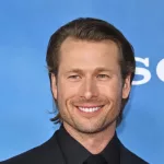 Glen Powell at the premiere for "Devotion" at the Regency Village Theatre. LOS ANGELES^ CA. November 15^ 2022