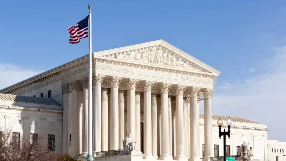 Facade of US Supreme court in Washington DC on sunny day