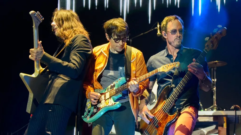 Rivers Cuomo^ Scott Shriner^ and Brian Bell of Weezer perform at the 2017 Forecastle Music Festival on July 16^ 2017 in Louisville^ Kentucky.