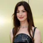 Anne Hathaway at the Versace FW23 Show at the Pacific Design Center on March 9^ 2023 in West Hollywood^ CA